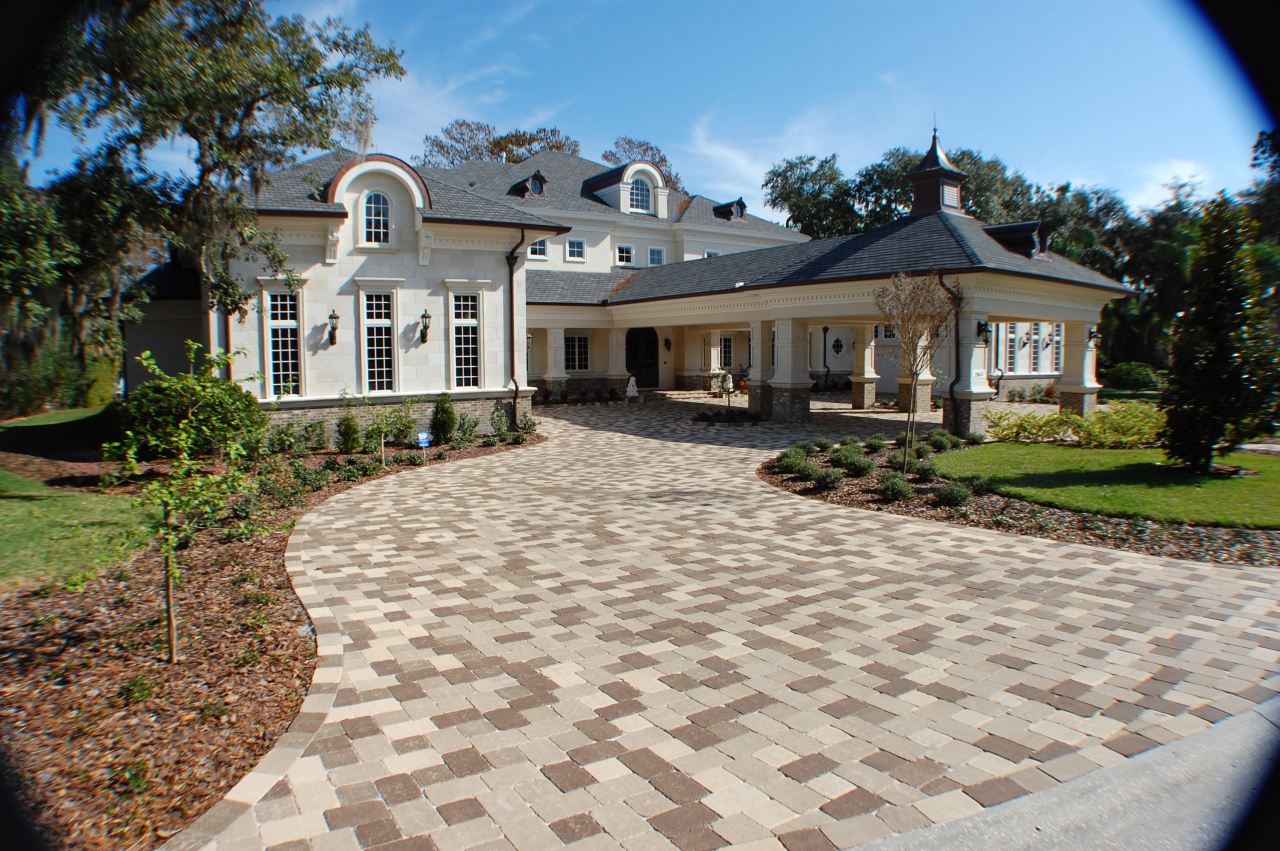 https://www.sealnlock.com/wp-content/uploads/2021/01/house-driveway-1-scaled.jpg